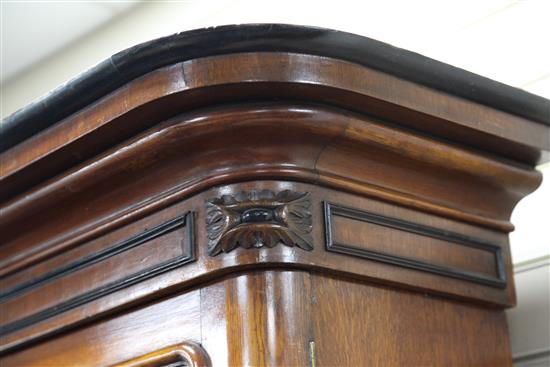 A Victorian ebony banded oak breakfront library bookcase, W.10ft D.1ft 9in. H.7ft 3in.